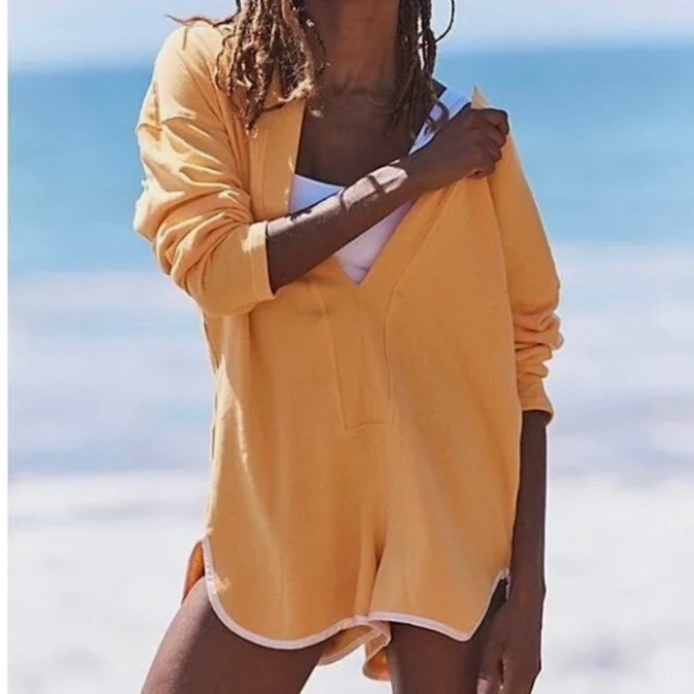 Free people movement take the plunge shortie romper in mango color